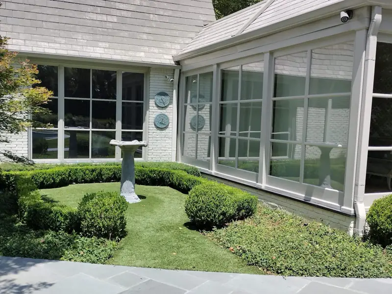 Reflective privacy film on a DFW home, seen from outside